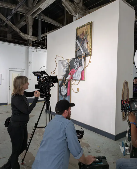 Camera crew at work in the gallery set
