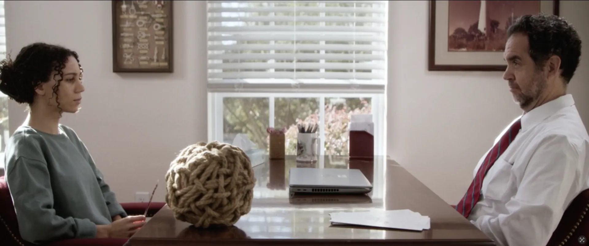 A consultation across a desk